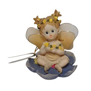 Vintage Crystal Castle Angel Sculpture Sitting on a Flower Cloth Wings 1970's